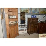 A retro metalware hall table and mirror