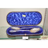 A cased pair of silver berry spoons