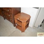 A 1930's oak three tier book table