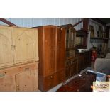 A reproduction mahogany gentleman's wardrobe