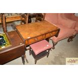 A reproduction walnut sofa table