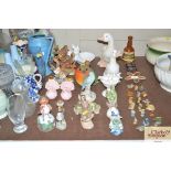 A collection of various bird ornaments