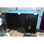A Bauhn 24" flat screen TV with remote control and