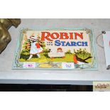 A decorative "Robin, The New Starch" enamel sign