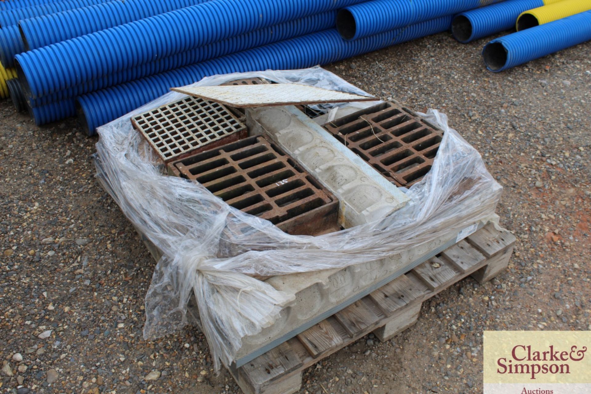 Quantity of cast iron drain grates etc.