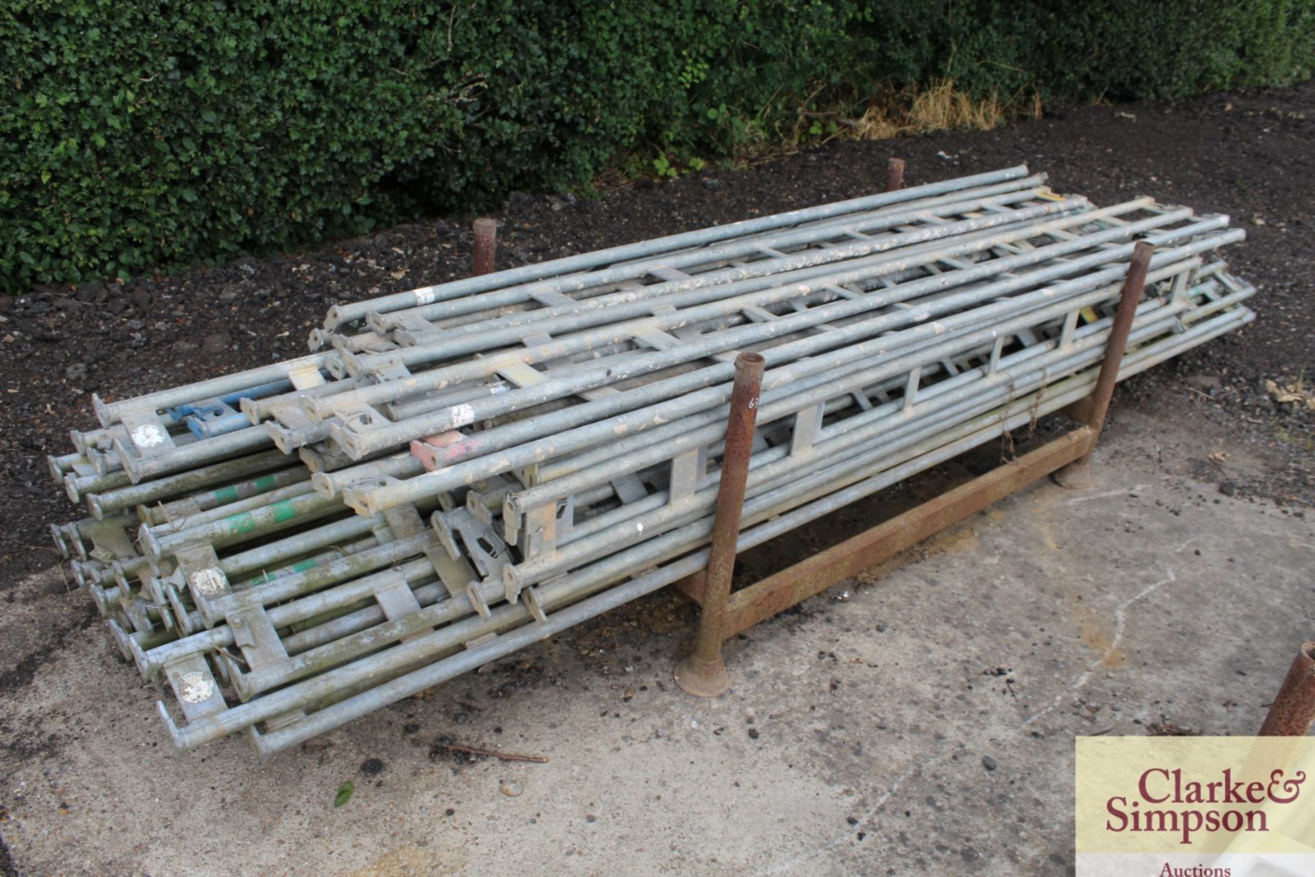 Stillage of mixed Haki Scaffolding Ledger Beams.