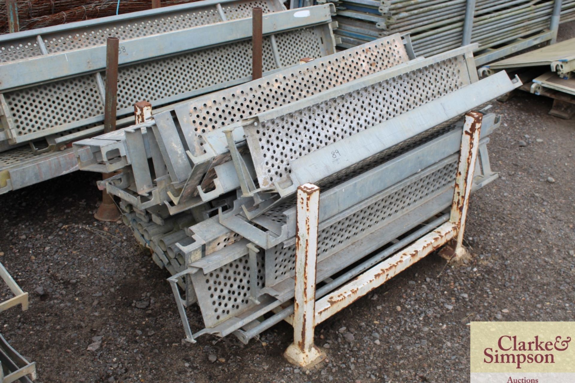 Stillage of Haki Scaffolding components. To include 1250 Steel Planks, Single Tube Beams, Ledger