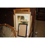 A quantity of various coloured prints, pine mirror