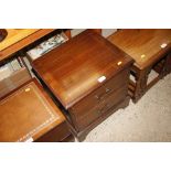 A mahogany two drawer bedside cabinet