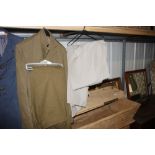 An Officers service uniform with three pairs of Of