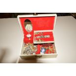 A jewellery box and contents to include various co