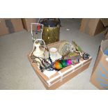 A box of various decorative table lamps and shades