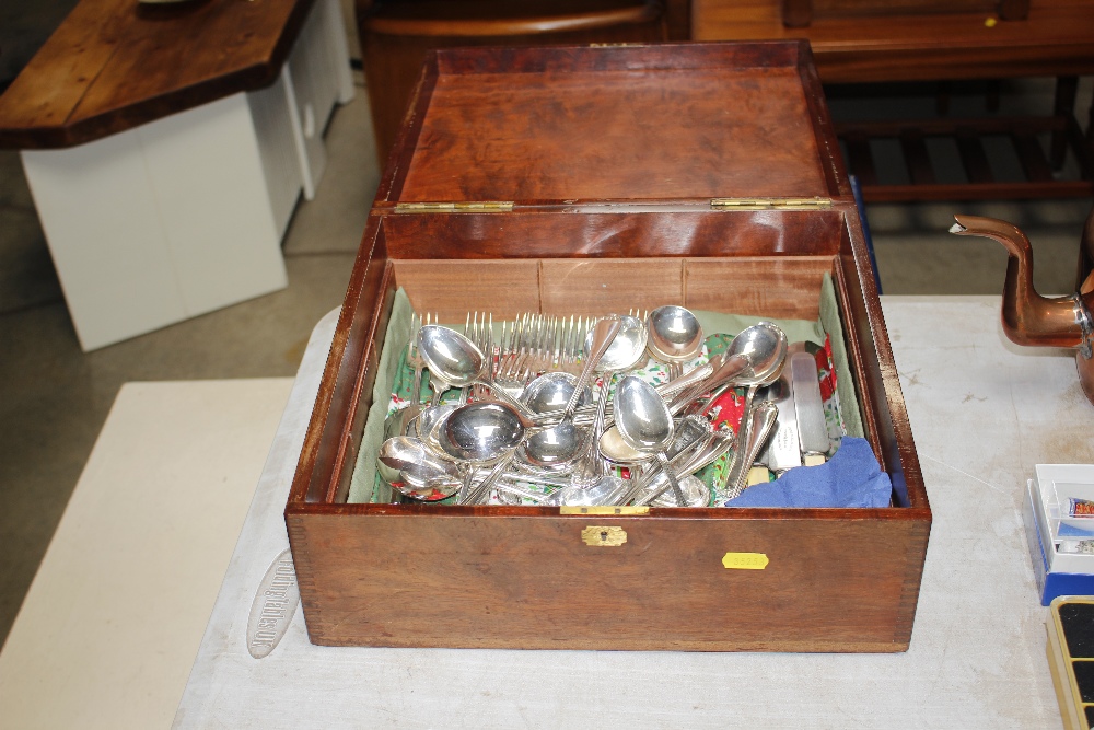 A mahogany box and contents of various silver plat