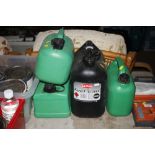 Four plastic fuel cans