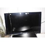 A Panasonic Viera flat screen TV with remote contr