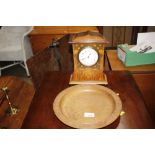 An Art Nouveau decorated mantle clock together wit