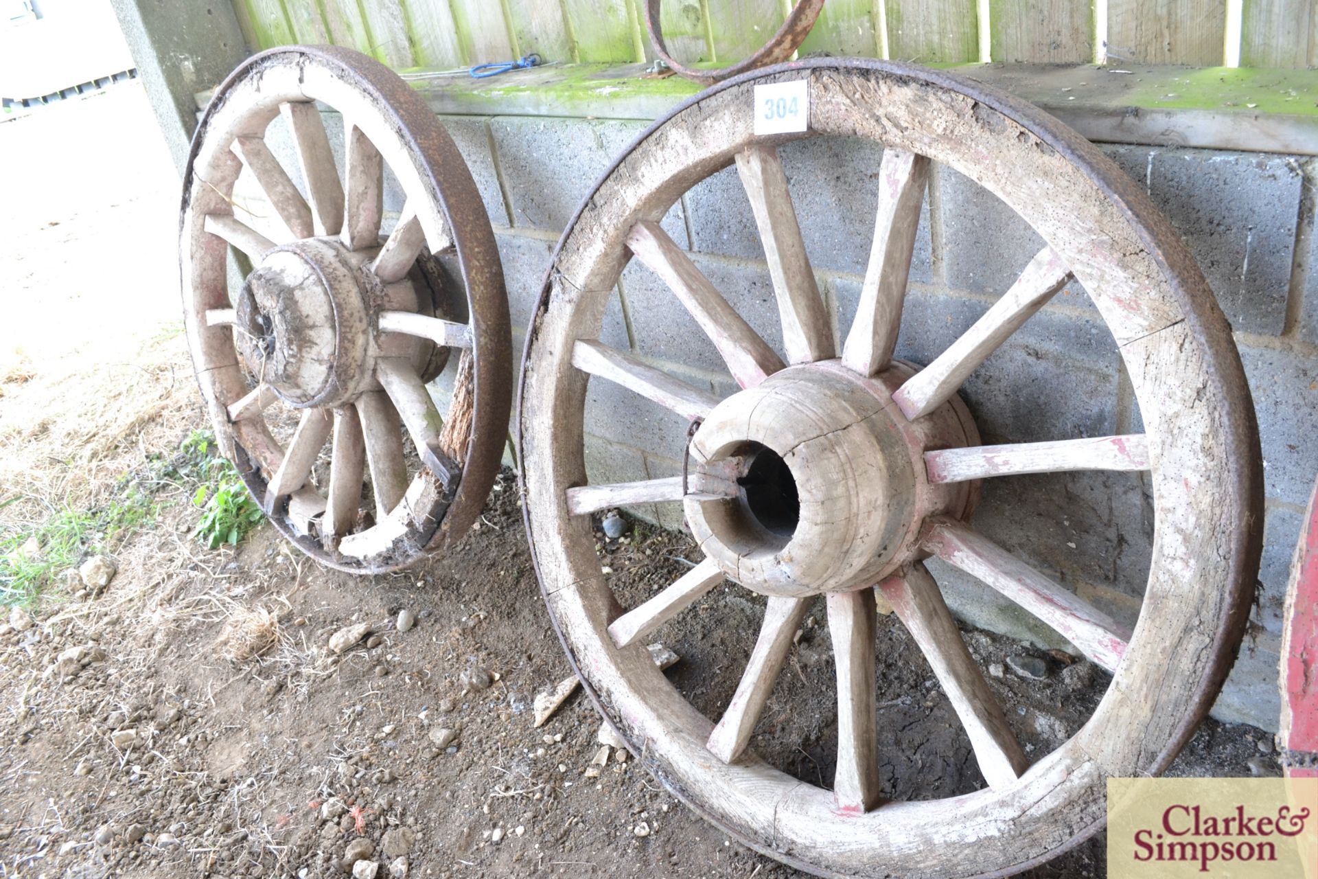 Pair of front wagon wheels.