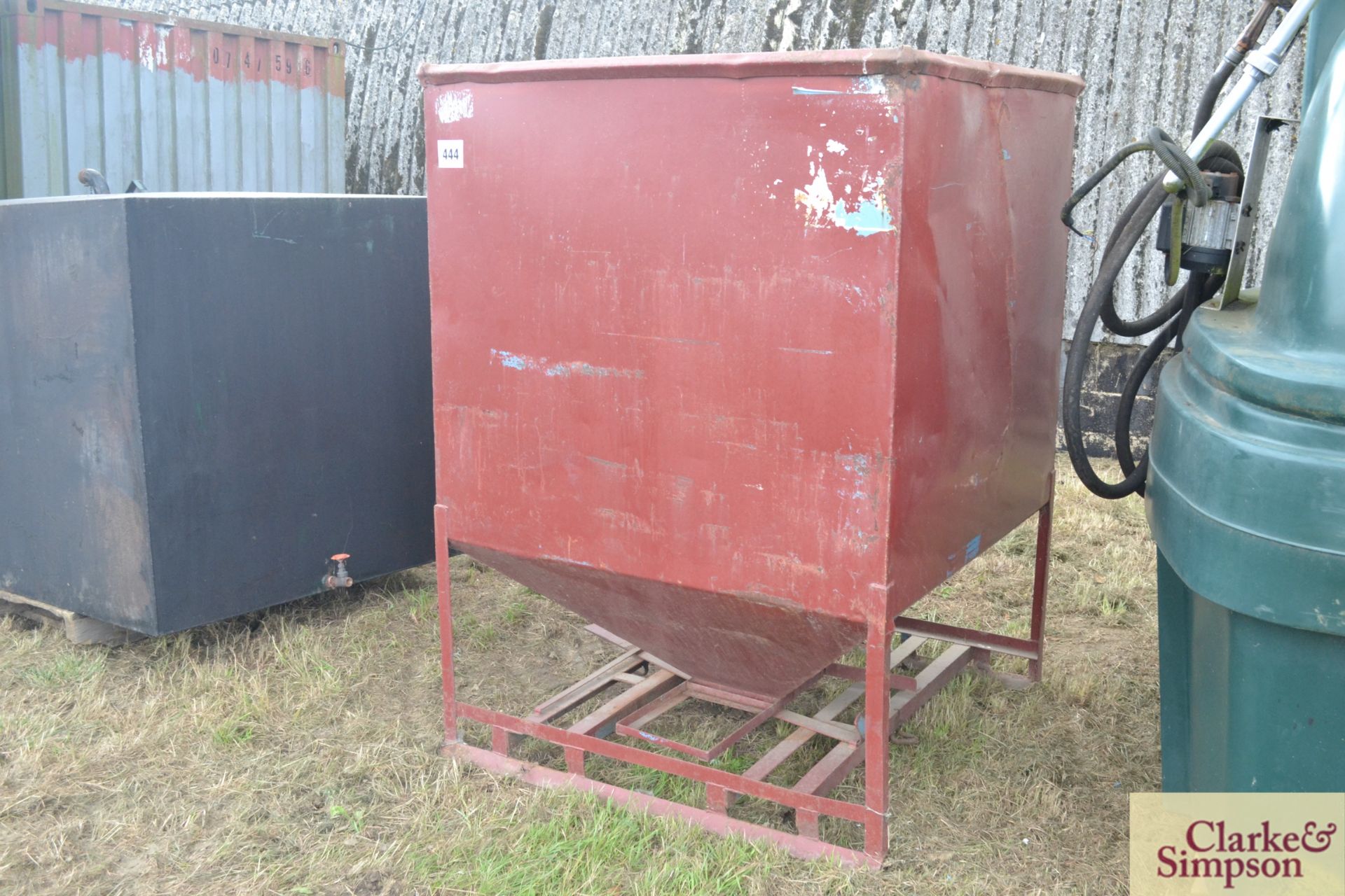 Forklift mounted bottom discharge hopper.