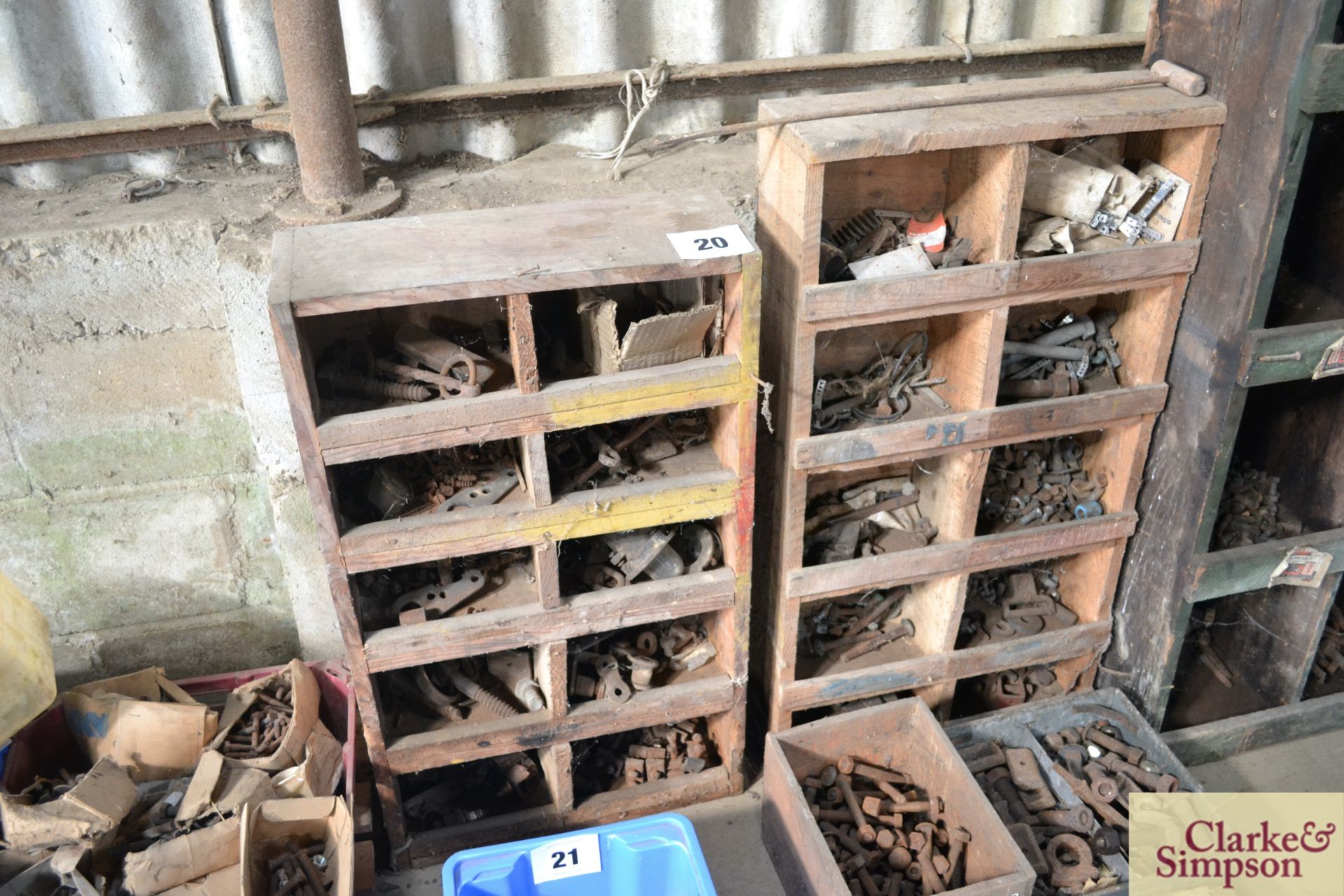 2x wooden storage units with contents of fasteners.