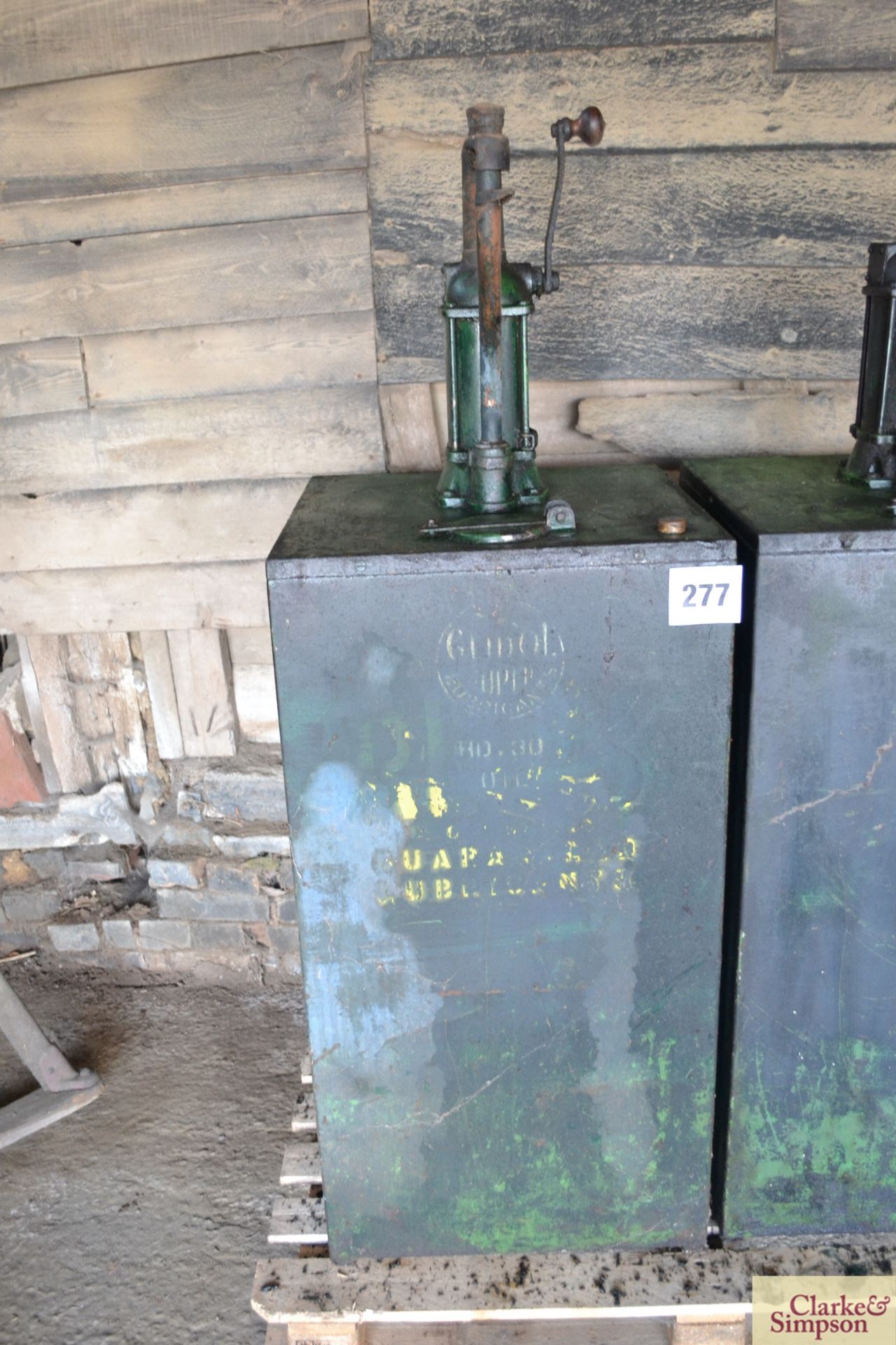 Glidol oil tank and pump.