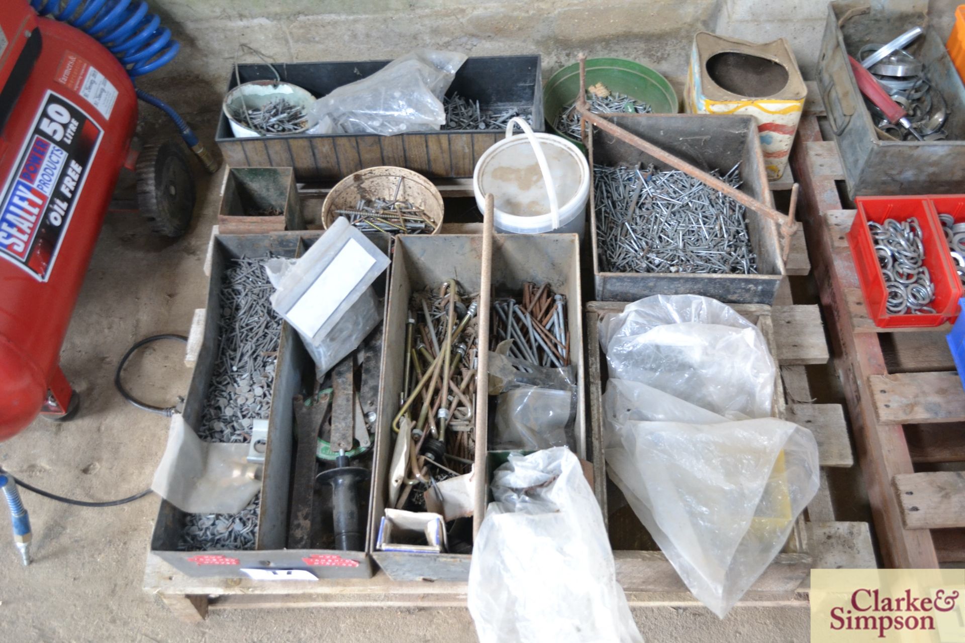 Pallet of various nails and fasteners.