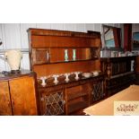 An oak Old Charm style dresser with leaded glazed