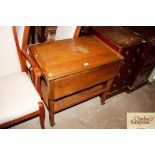 An oak drop leaf trolley