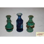 A collection of three green and blue Roman style m
