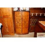 A 1930's walnut gent's wardrobe with Bakelite hand