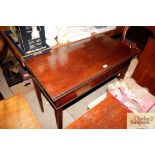 A mahogany fold over tea table