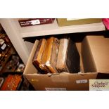 A box of various watercolours, albums, silhouettes