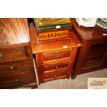 An oak three drawer chest