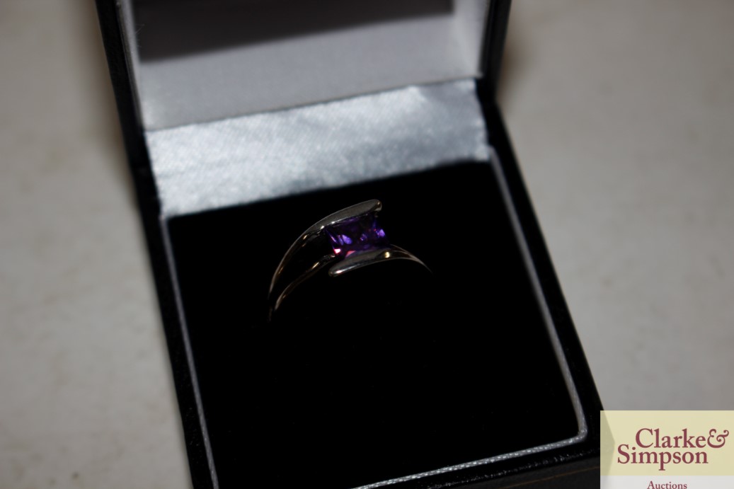A boxed amethyst and 925 silver ring