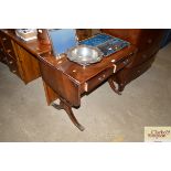 A mahogany sofa table