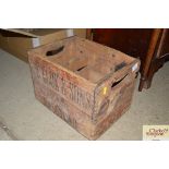 A wooden advertising crate for Cook & Sons