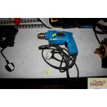 A Makita electric hand drill