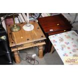 A nest of two reproduction occasional tables; and