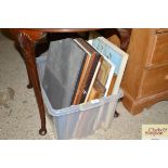 A box containing miscellaneous pictures and prints