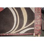 An approx 7'7" x 5'3" Dunelm modern rug