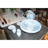 A daisy patterned wash set to include two bowls, t