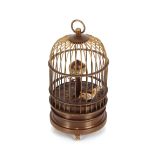 A brass bird cage style clock