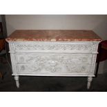 A French cream painted commode, surmounted by a ma