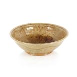 A Studio pottery celadon ground bowl, impress mark