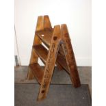 A wooden folding Champagne ladder