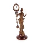 An Art Nouveau style Mystery clock, 30cm high