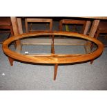A Stateroom by Stonehill teak and glass oval coffee table, 130cm