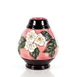 A small Moorcroft baluster vase designed by JJ Han