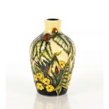 A small Moorcroft baluster vase, the base stamped