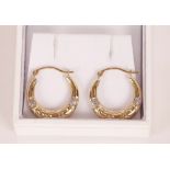 A pair of 9ct gold creole ear-rings