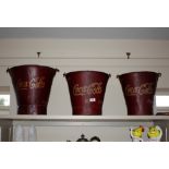 Three reproduction graduated Coca Cola buckets